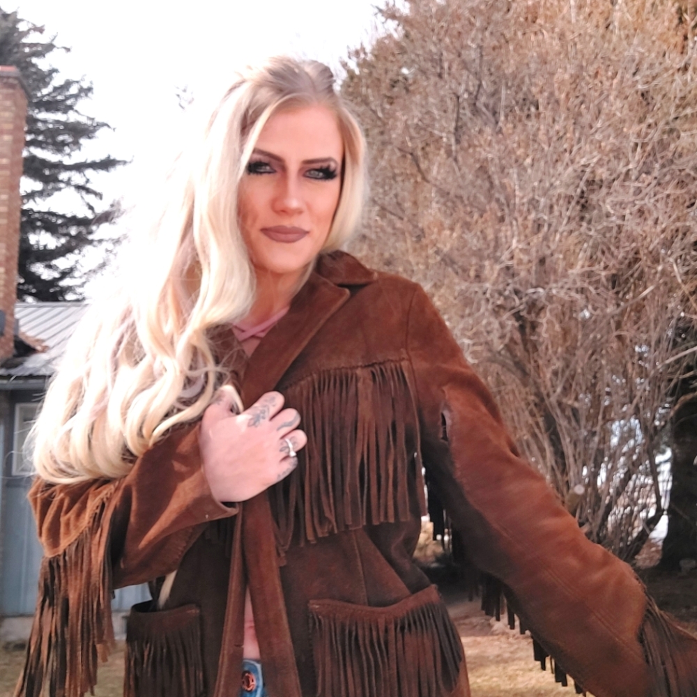 Vintage 60s or 70s  fringe leather jacket.